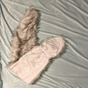 The outside is fake fur and the inside is satin